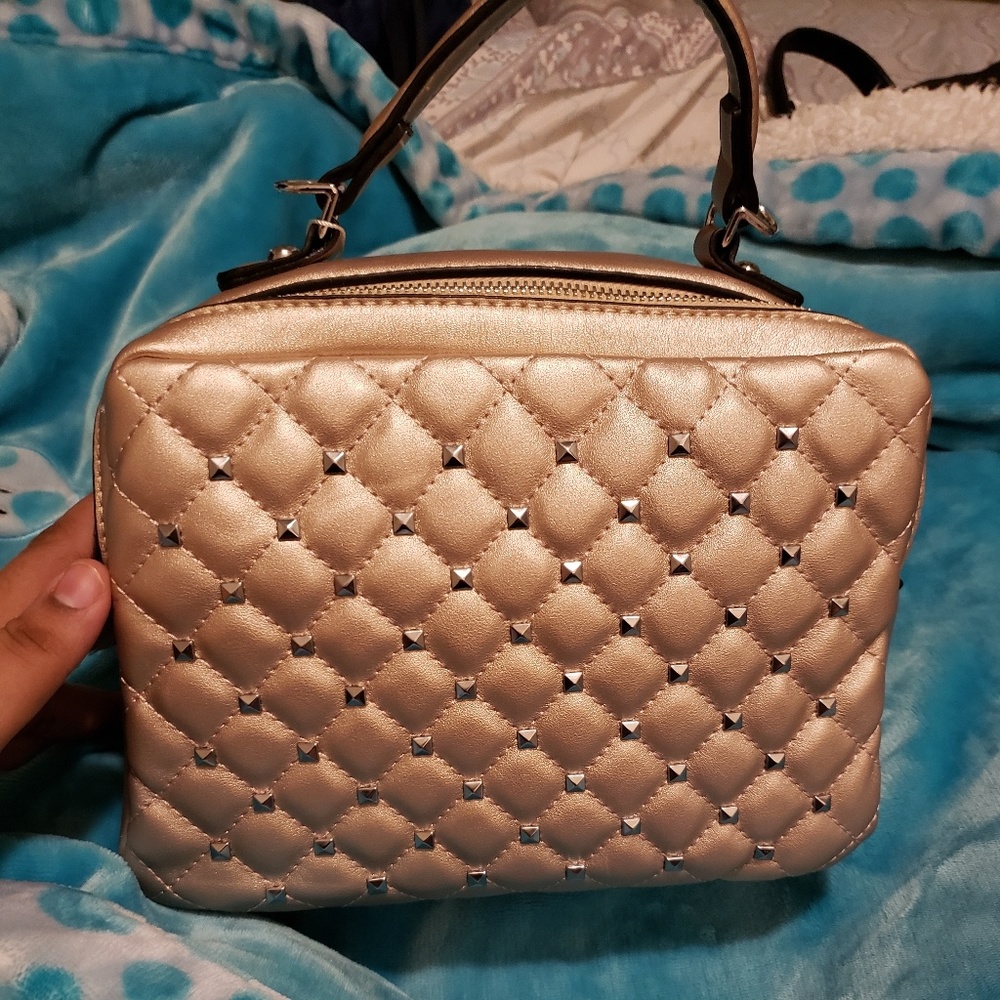 Champagne color studded handbag